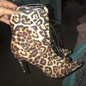 Super cute laced up cheetah heels